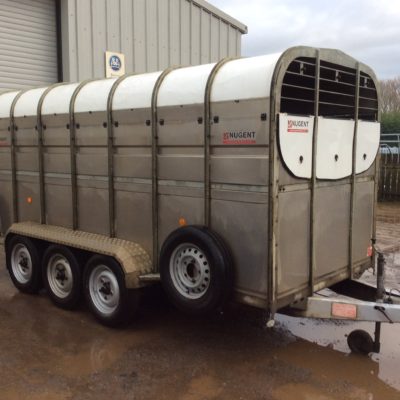Nugent livestock trailer tri axle with wheels on the outside. Comes complete with 2 cattle partitions, front vents, LED lights & spare wheel.
